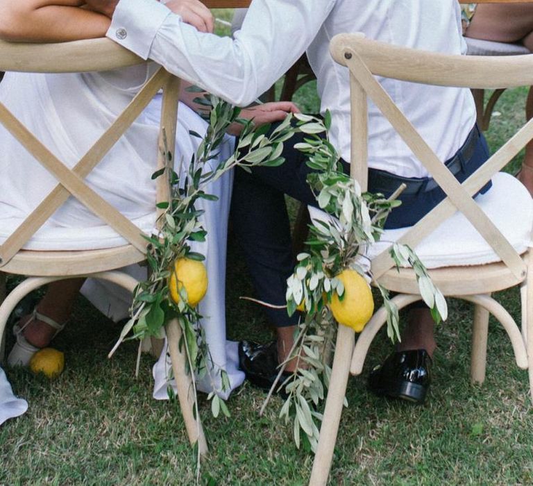 Lemon Wedding Decor On Chair Back Of Bride and Groom