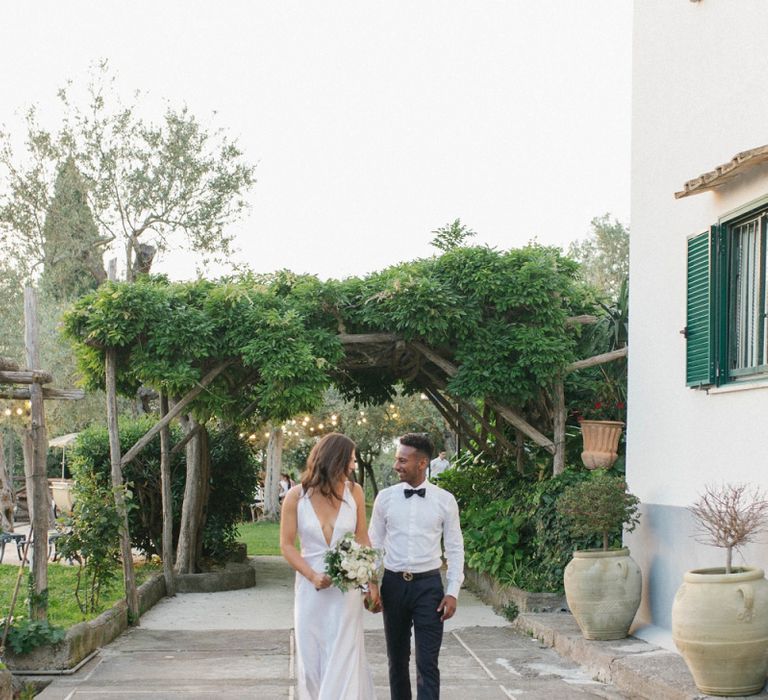 Bride and Groom Walk Through Italian Wedding