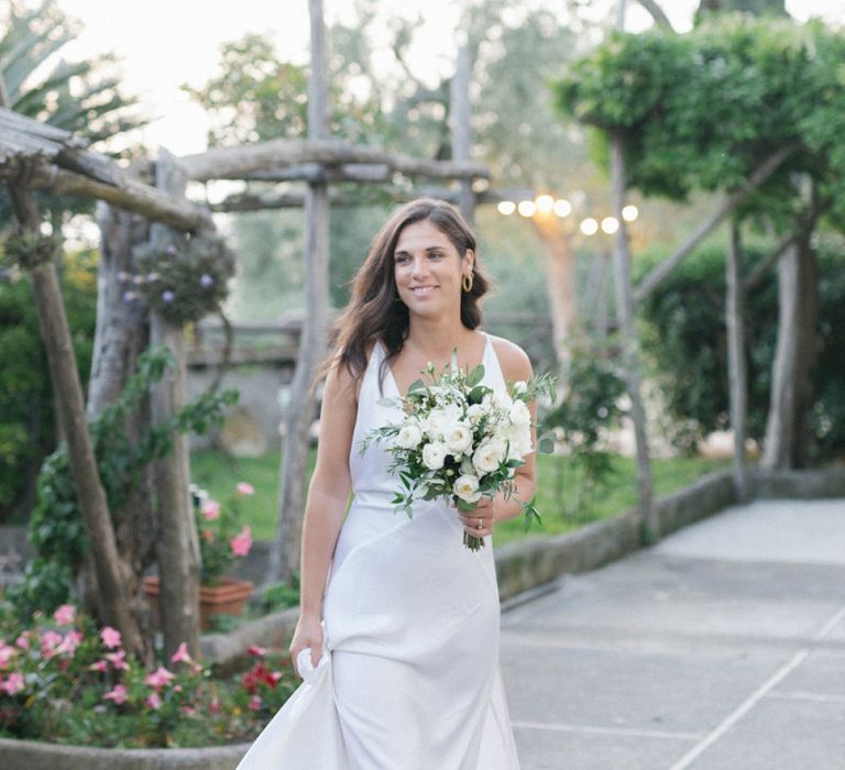 Pontoon Lighting With Bride In Elegant Bride Dress With White Bouquet