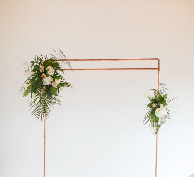 Copper Frame Altar Decorated with Botanical Green, White and Pink Flowers