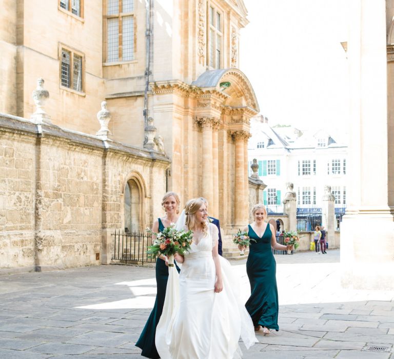 Bride in Sassi Holford Tamara Wedding Dress with Her Bridesmaids in Forest Green Jenny Yoo Dresses