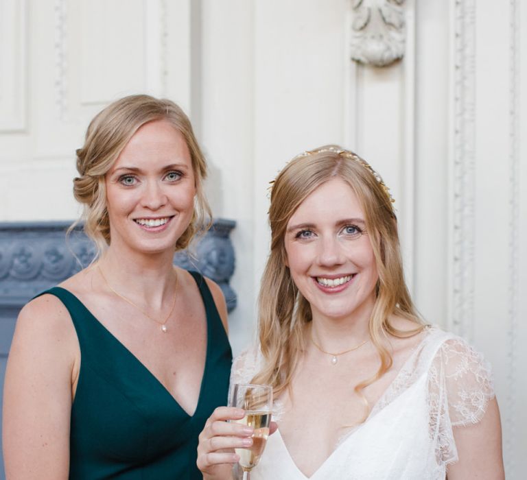 Bride in Sassi Holford Tamara Wedding Dress and Bridesmaid in Forest Green Jenny Yoo  Dress