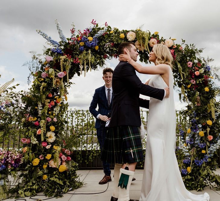 Bride and groom tie the knot at private rooftop ceremony