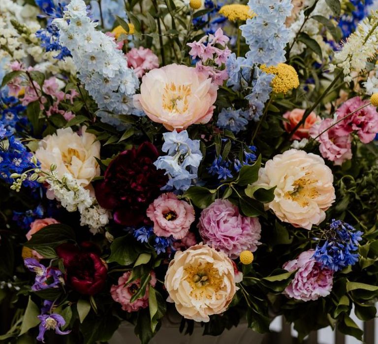 Brightly coloured floral decor at summer wedding in London