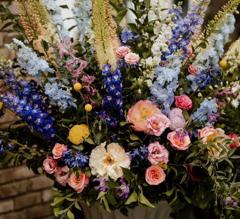 Bright multi-coloured floral decor at whimsical wedding in London