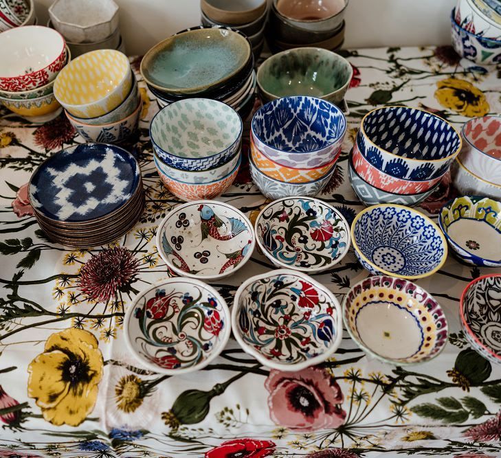 Bright multi-coloured tableware for Persian styled sharing banquet