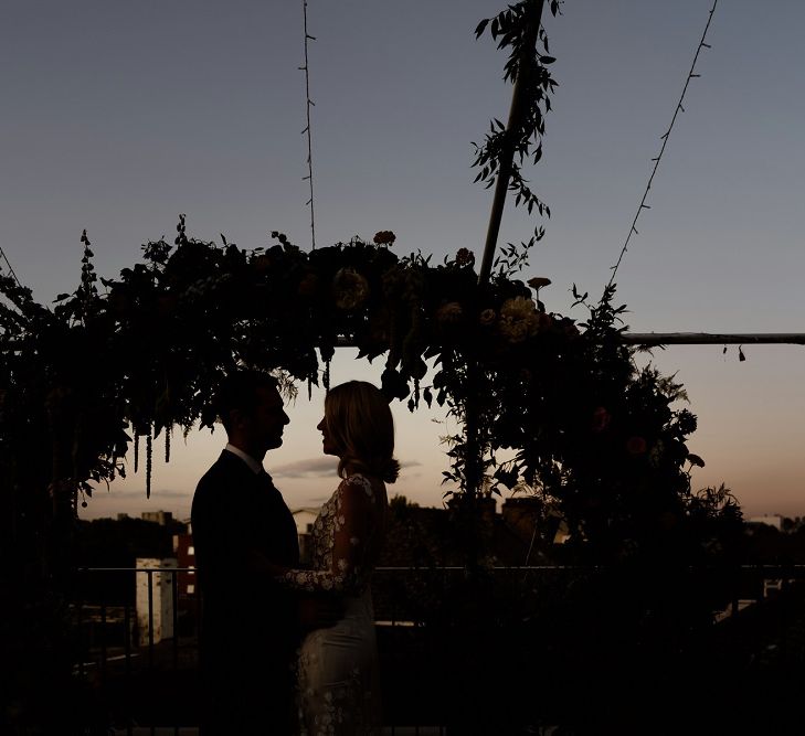 Outdoor rooftop wedding in London with bridal jumpsuit