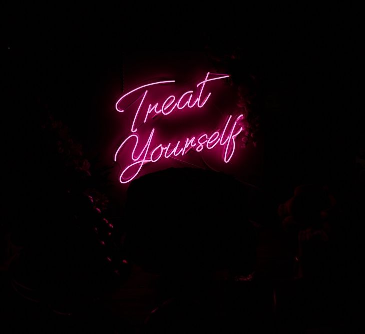 Pink neon sign at private rooftop wedding in London