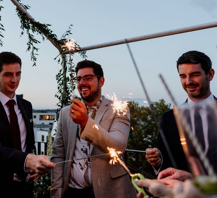 Sparklers to celebrate at private rooftop wedding