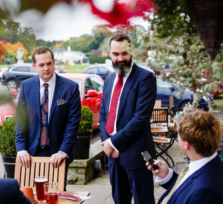 Autumnal Village Wedding with Deep Red &amp; Blue Colour Scheme at Ramster Hall, Surrey | Watters Bridal Gown | Warehouse Bridesmaid Dresses | Navy Suit Supply Suits | Tony Hart Photo