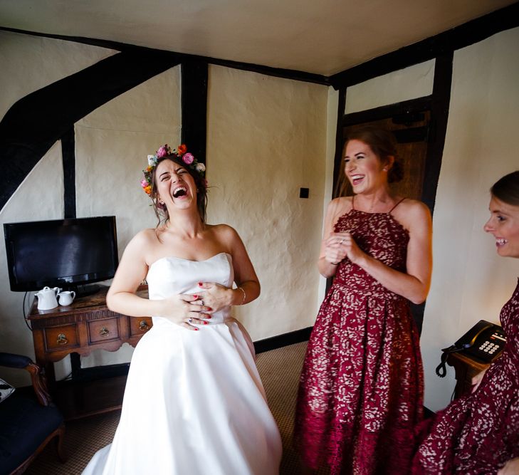 Autumnal Village Wedding with Deep Red &amp; Blue Colour Scheme at Ramster Hall, Surrey | Watters Bridal Gown | Warehouse Bridesmaid Dresses | Navy Suit Supply Suits | Tony Hart Photo