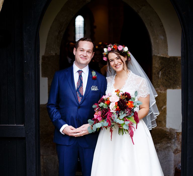 Autumnal Village Wedding with Deep Red &amp; Blue Colour Scheme at Ramster Hall, Surrey | Watters Bridal Gown | Warehouse Bridesmaid Dresses | Navy Suit Supply Suits | Tony Hart Photo