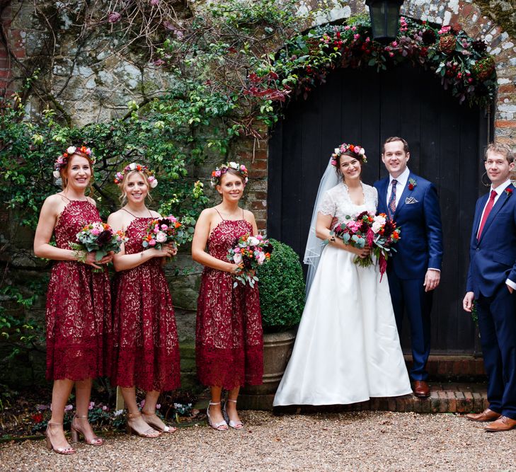 Autumnal Village Wedding with Deep Red &amp; Blue Colour Scheme at Ramster Hall, Surrey | Watters Bridal Gown | Warehouse Bridesmaid Dresses | Navy Suit Supply Suits | Tony Hart Photo