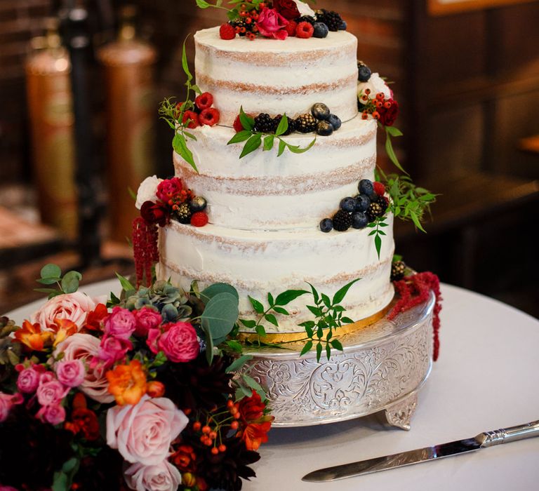 Autumnal Village Wedding with Deep Red &amp; Blue Colour Scheme at Ramster Hall, Surrey | Watters Bridal Gown | Warehouse Bridesmaid Dresses | Navy Suit Supply Suits | Tony Hart Photo