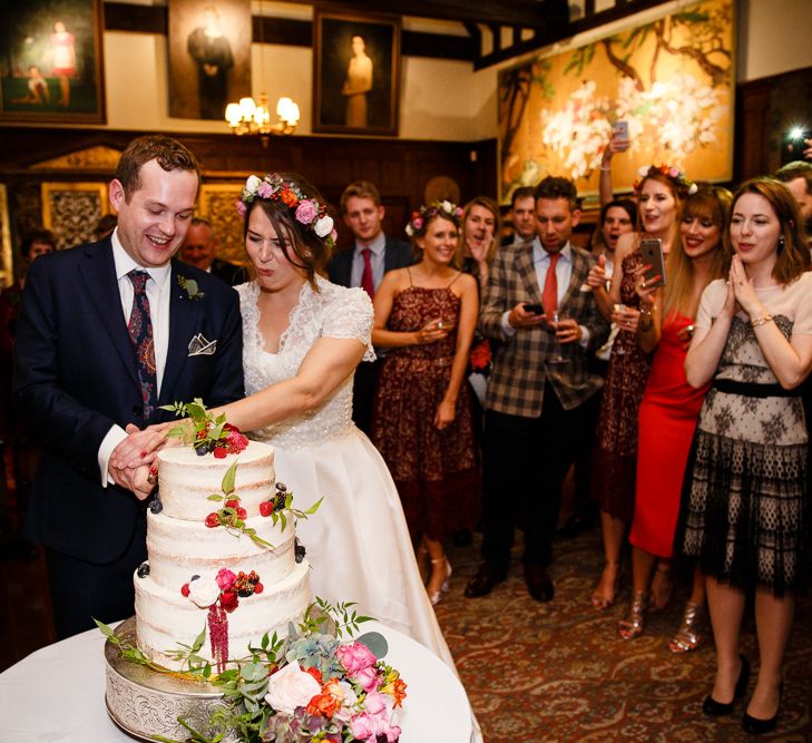 Autumnal Village Wedding with Deep Red &amp; Blue Colour Scheme at Ramster Hall, Surrey | Watters Bridal Gown | Warehouse Bridesmaid Dresses | Navy Suit Supply Suits | Tony Hart Photo