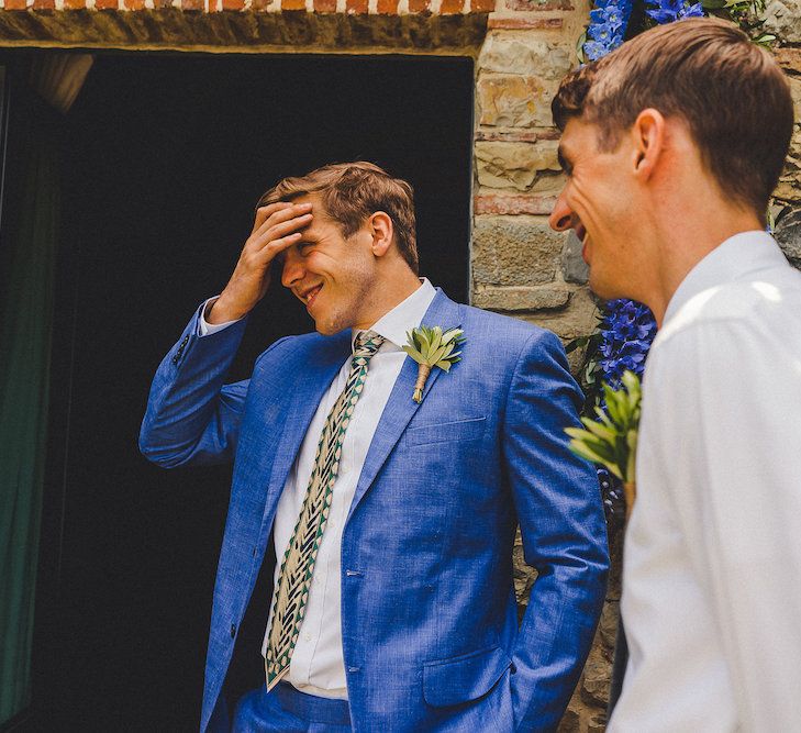 Intimate Prosecco Pool Party Wedding in Tuscany. Bride wears Livio Lacurre Gown, Groom wears Beggars Run Custom Suit. Photography by Livio Lacurre.