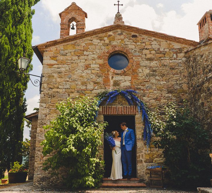 Flowers by Stiatti Fiori. Intimate Prosecco Pool Party Wedding in Tuscany. Bride wears Livio Lacurre Gown, Groom wears Beggars Run Custom Suit. Photography by Livio Lacurre.