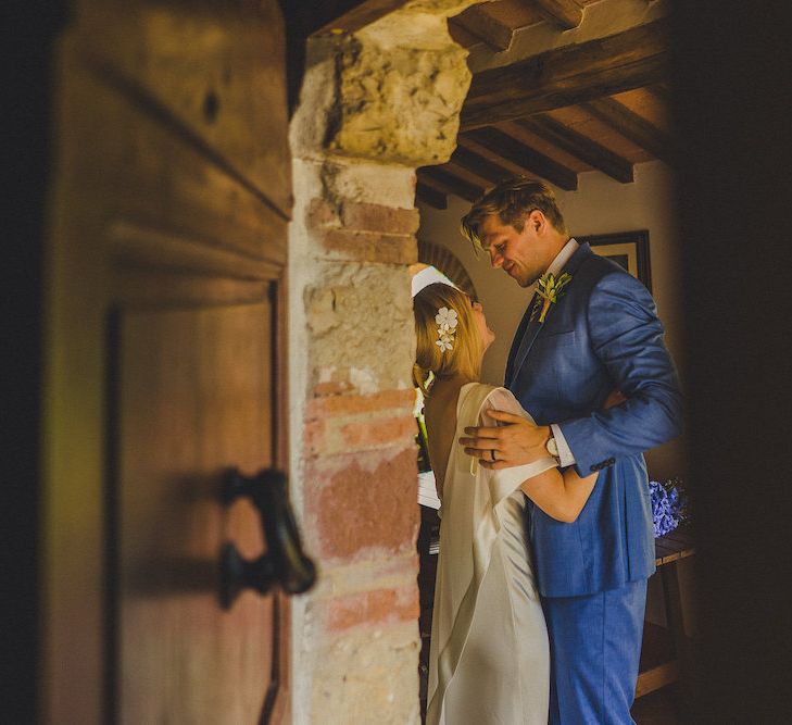 Intimate Prosecco Pool Party Wedding in Tuscany. Bride wears Livio Lacurre Gown, Groom wears Beggars Run Custom Suit. Photography by Livio Lacurre.