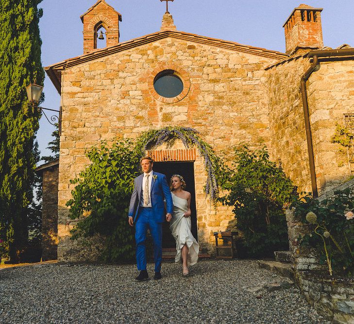 Flowers by Stiatti Fiori. Intimate Prosecco Pool Party Wedding in Tuscany. Bride wears Livio Lacurre Gown, Groom wears Beggars Run Custom Suit. Photography by Livio Lacurre.