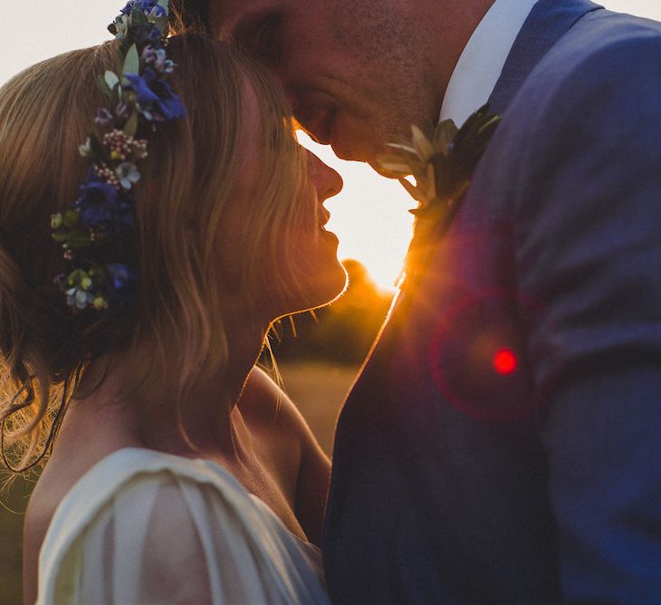 Intimate Prosecco Pool Party Wedding in Tuscany. Bride wears Livio Lacurre Gown, Groom wears Beggars Run Custom Suit. Photography by Livio Lacurre.