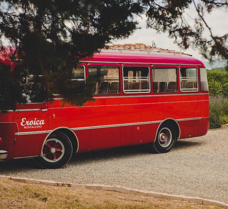 Vintage Bus Wedding Transport from Drive in Style. Intimate Prosecco Pool Party Wedding in Tuscany. Bride wears Livio Lacurre Gown, Groom wears Beggars Run Custom Suit. Photography by Livio Lacurre.