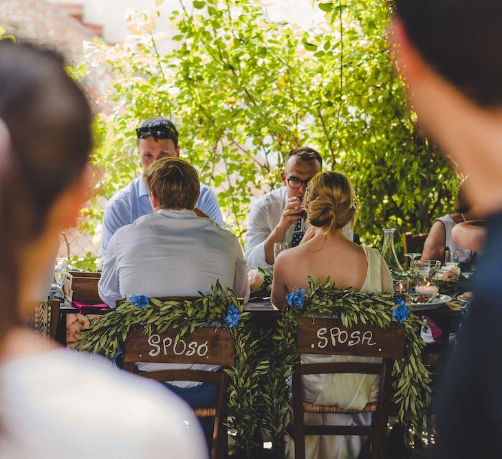 Flowers by Stiatti Fiori. La Pieve Marsina. Intimate Prosecco Pool Party Wedding in Tuscany. Bride wears Livio Lacurre Gown, Groom wears Beggars Run Custom Suit. Photography by Livio Lacurre.