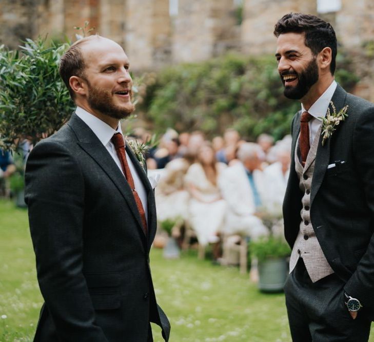 Groom waiting at the aisle of Newburgh Priory for outdoor ceremony with Italian twist