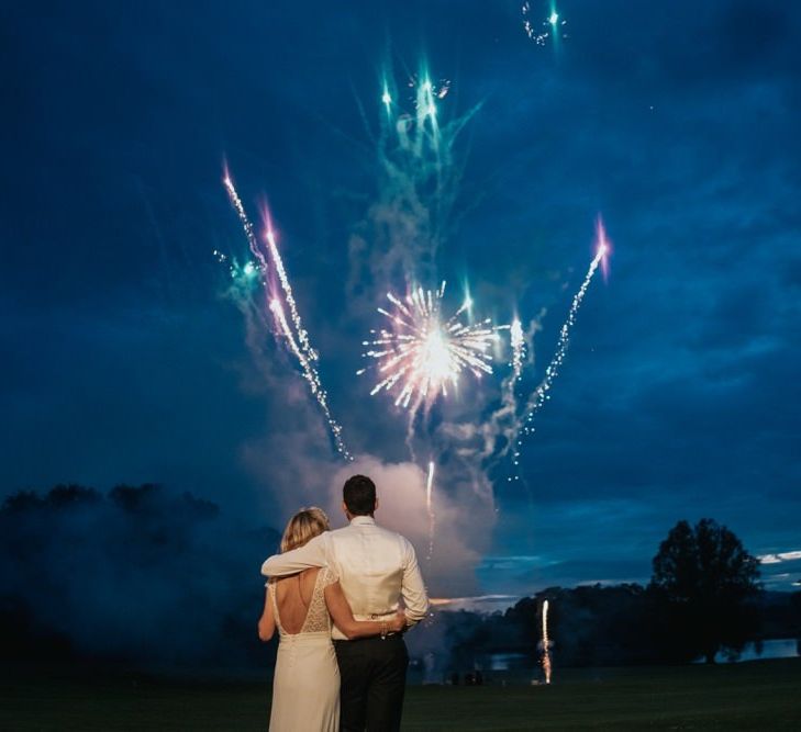 Bride and groom enjoy the fireworks at Newburgh Priory wedding