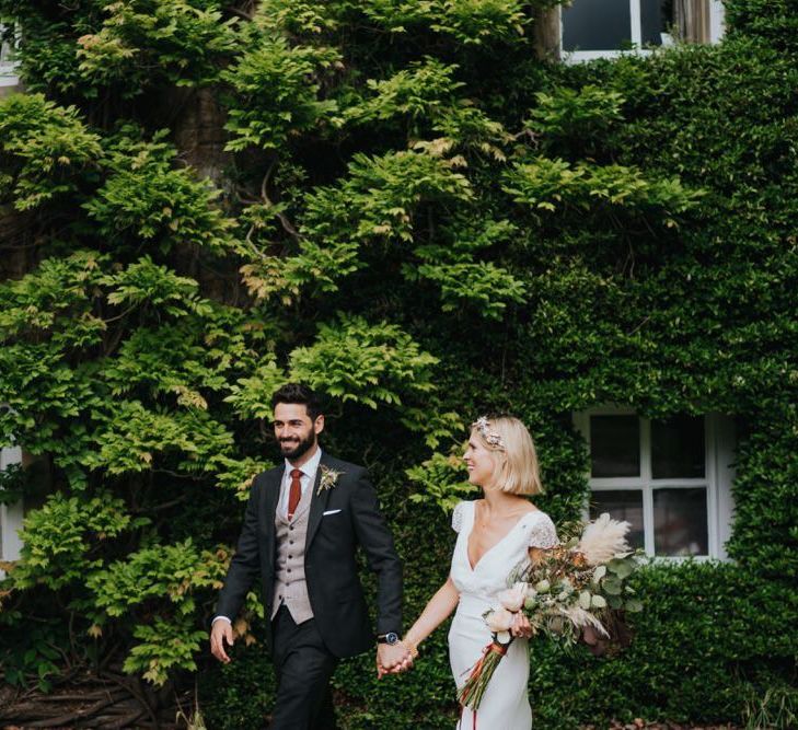 Bride and groom at Newburgh Priory outdoor wedding in Spring