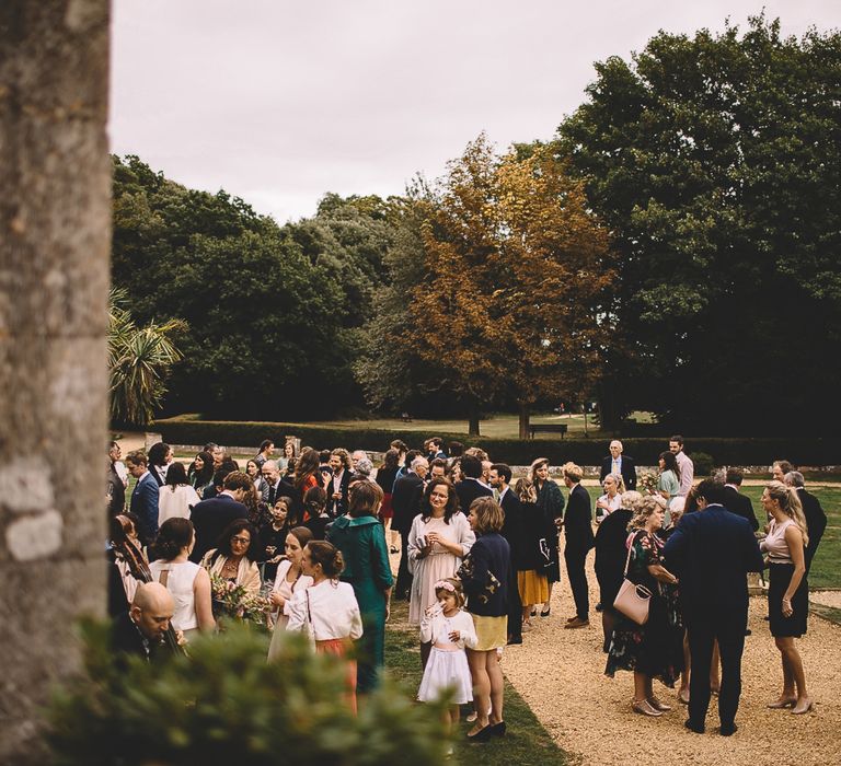 Wedding Guests Outside The Wedding Venue