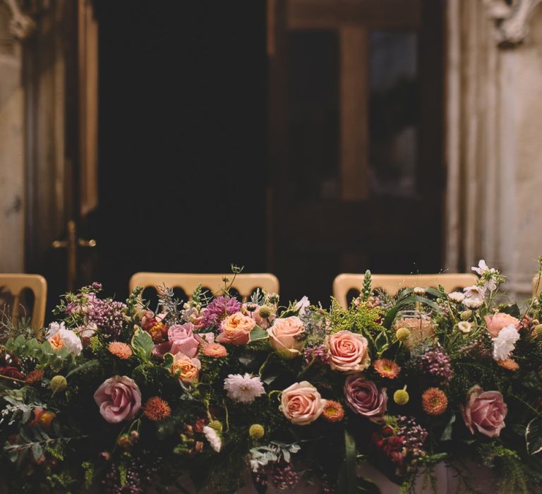 Top Table Wedding Flowers with Pink, Peach and Yellow Roses