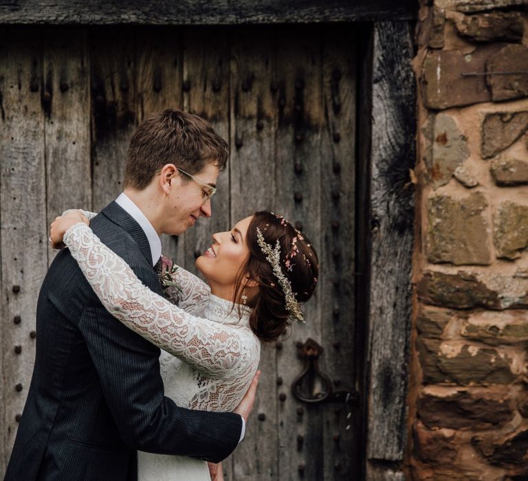 Bride and groom embracing