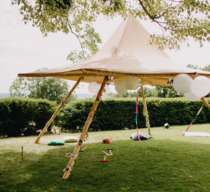 Naked Tipi Shaded Area with Giant Balloons Wedding Decor | DIY Rustic Tipi Wedding at Riverhill Gardens, Sevenoaks | Frances Sales Photography