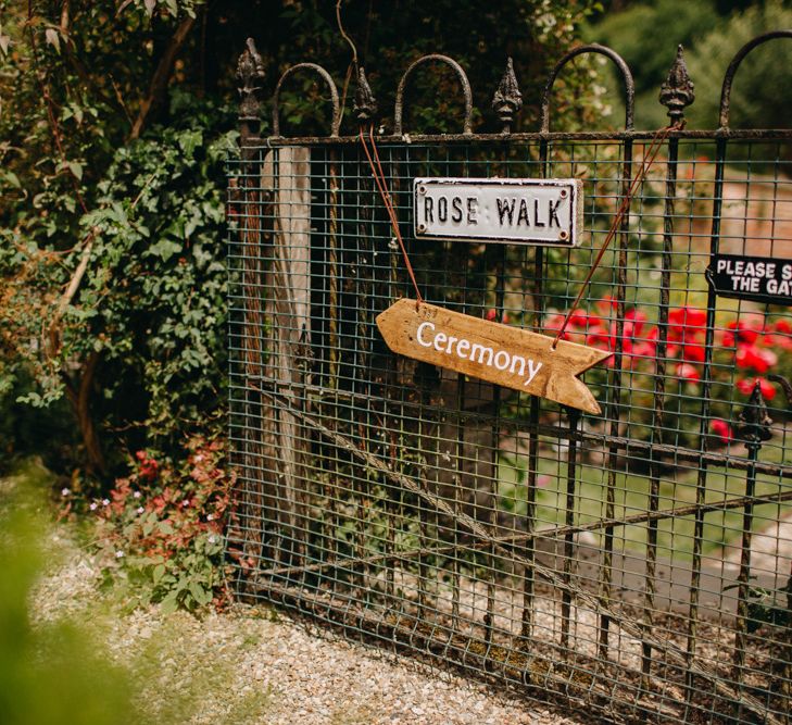 Wooden Arrow Direction Sign | DIY Rustic Tipi Wedding at Riverhill Gardens, Sevenoaks | Frances Sales Photography