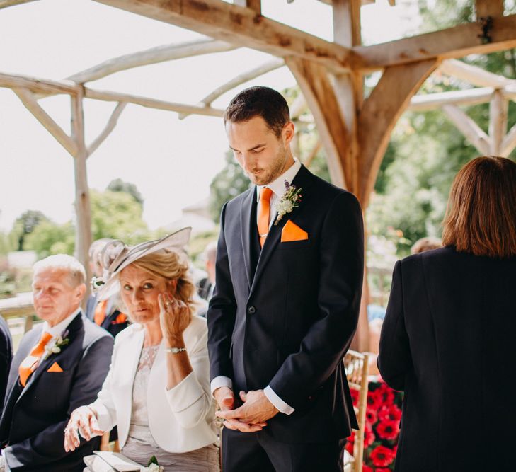 Groom in Moss Bros. Suit at the Altar | DIY Rustic Tipi Wedding at Riverhill Gardens, Sevenoaks | Frances Sales Photography