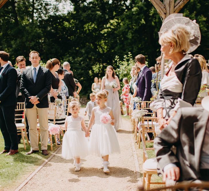 Wedding Ceremony Flower Girl Entrance | DIY Rustic Tipi Wedding at Riverhill Gardens, Sevenoaks | Frances Sales Photography