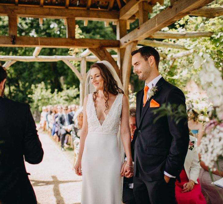 Wedding Ceremony | Bride in Halo &amp; Wren Wedding Dress | Groom in Moss Bros. Suit | DIY Rustic Tipi Wedding at Riverhill Gardens, Sevenoaks | Frances Sales Photography