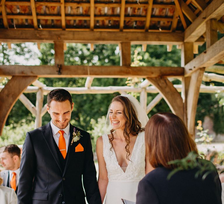 Wedding Ceremony | Bride in Halo &amp; Wren Wedding Dress | Groom in Moss Bros. Suit | DIY Rustic Tipi Wedding at Riverhill Gardens, Sevenoaks | Frances Sales Photography