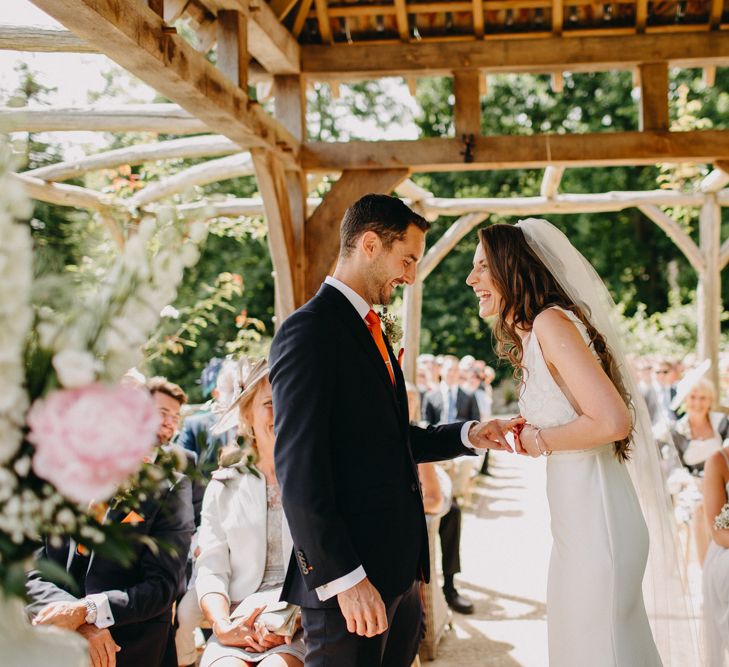 Wedding Ceremony | Bride in Halo &amp; Wren Wedding Dress | Groom in Moss Bros. Suit | DIY Rustic Tipi Wedding at Riverhill Gardens, Sevenoaks | Frances Sales Photography