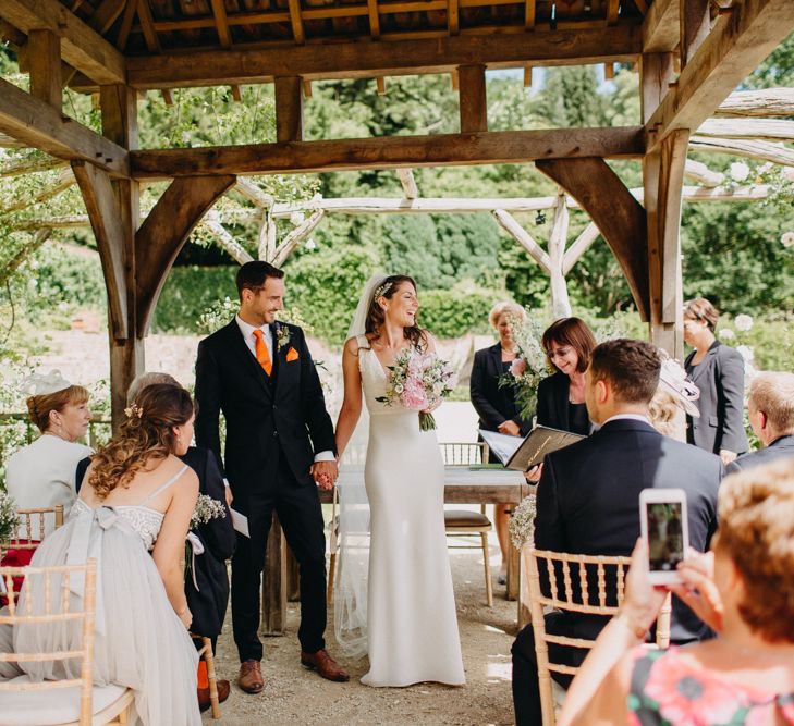 Wedding Ceremony | Bride in Halo &amp; Wren Wedding Dress | Groom in Moss Bros. Suit | DIY Rustic Tipi Wedding at Riverhill Gardens, Sevenoaks | Frances Sales Photography