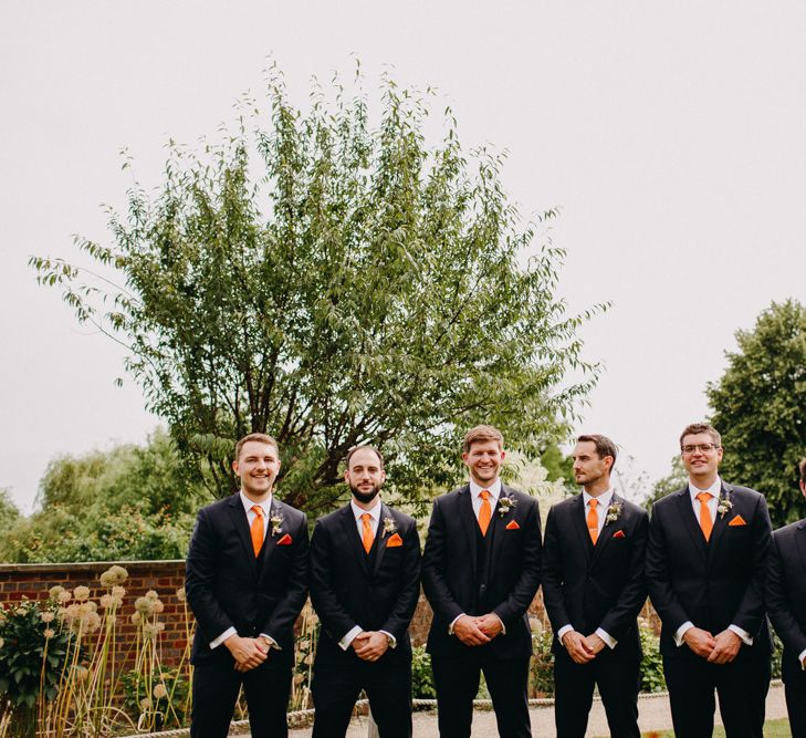 Groomsmen in Moss Bros. Suits &amp; Orange Ties | DIY Rustic Tipi Wedding at Riverhill Gardens, Sevenoaks | Frances Sales Photography