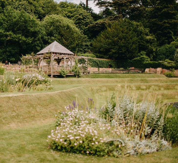 Outdoor Wedding Ceremony Arbour | DIY Rustic Tipi Wedding at Riverhill Gardens, Sevenoaks | Frances Sales Photography