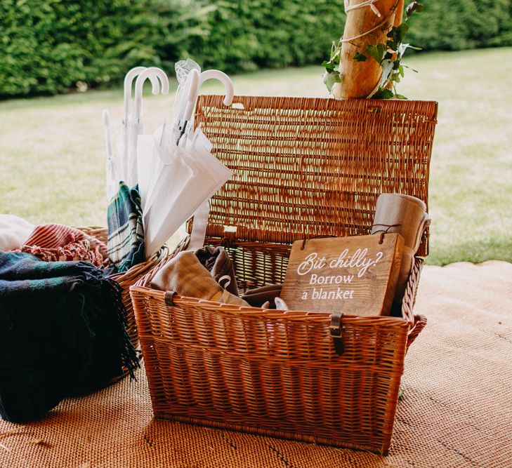 Wicker Basket Blanket Box | Wedding Decor | DIY Rustic Tipi Wedding at Riverhill Gardens, Sevenoaks | Frances Sales Photography