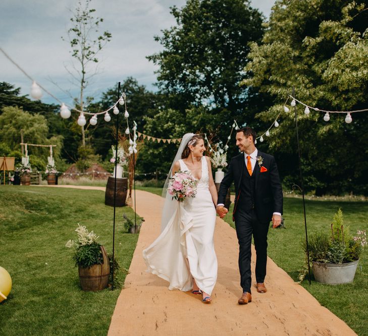 Bride in Halo &amp; Wren Wedding Dress | Groom in Moss Bros. Suit | DIY Rustic Tipi Wedding at Riverhill Gardens, Sevenoaks | Frances Sales Photography