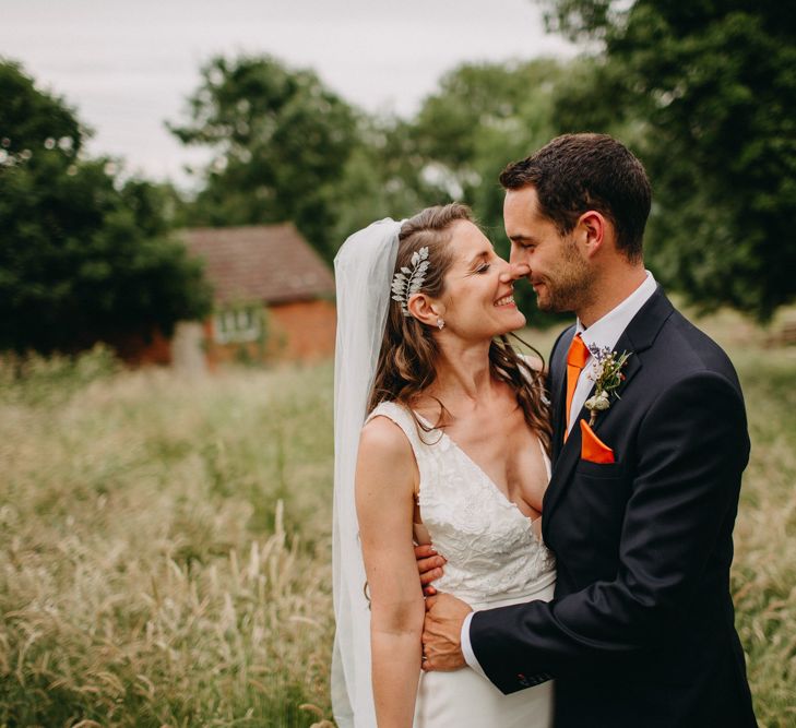 Bride in Halo &amp; Wren Wedding Dress | Groom in Moss Bros. Suit | DIY Rustic Tipi Wedding at Riverhill Gardens, Sevenoaks | Frances Sales Photography