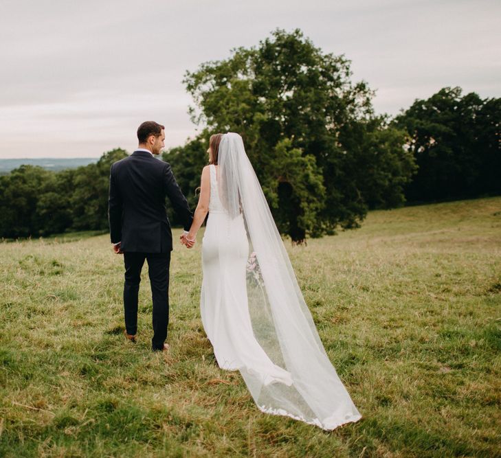 Bride in Halo &amp; Wren Wedding Dress | Groom in Moss Bros. Suit | DIY Rustic Tipi Wedding at Riverhill Gardens, Sevenoaks | Frances Sales Photography