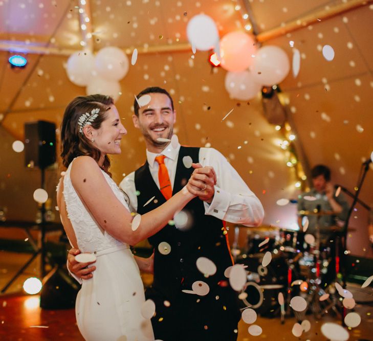 Confetti Bomb First Dance | Bride in Halo &amp; Wren Wedding Dress | Groom in Moss Bros. Suit | DIY Rustic Tipi Wedding at Riverhill Gardens, Sevenoaks | Frances Sales Photography