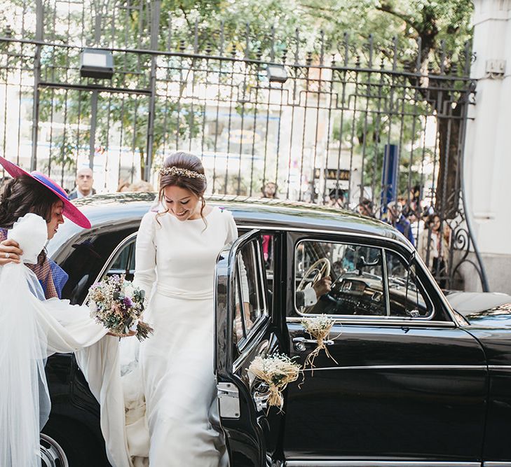 Bride Arriving in Wedding Car in Nnavascues Embroidered Back Wedding Dress