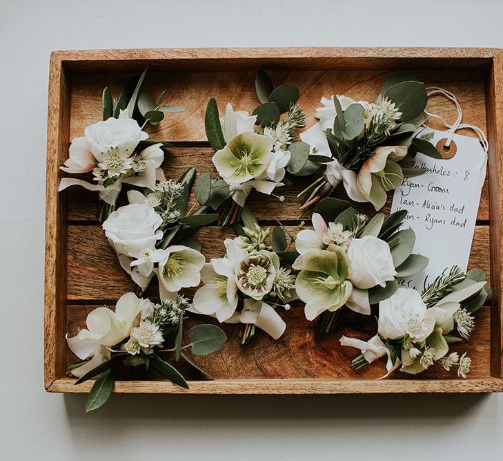 Wooden Tray of White and Green Buttonholes