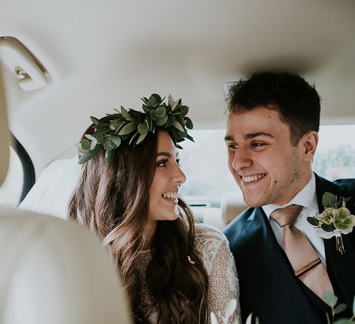 Bride and Groom in the Wedding Car